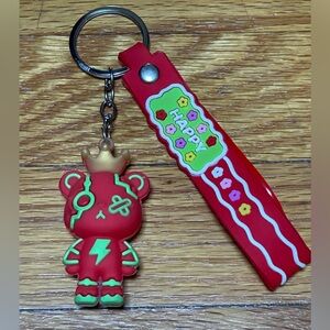 Red Robot Kaws Bear with Crown Keychain with 'Happy' Strap